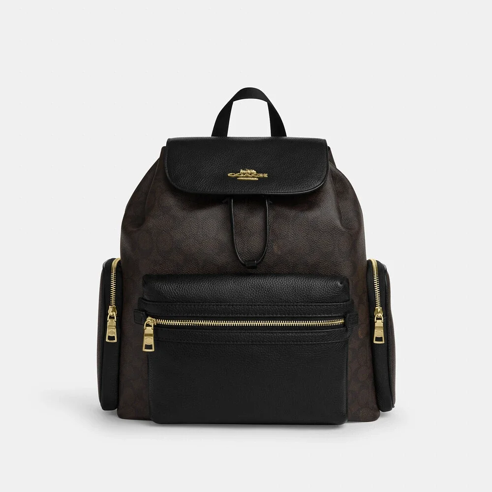 New with tags Coach Baby Backpack In Signature Canvas in original packaging.